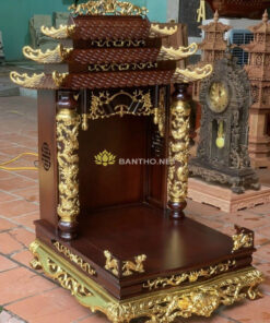 Bàn thờ thần tài mái chùa thếp điểm vàng