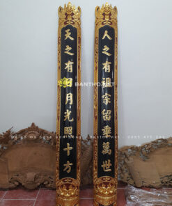 Đôi câu đối máng bằng gỗ nền then