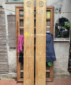 Đôi câu đối đục tay mộc chưa sơn
