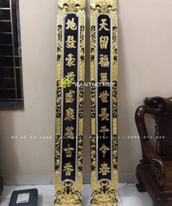 Câu đối thờ gia tiên chạm trên dơi dưới quả