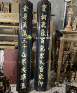 Cặp câu đối máng nền then sơn giả cổ